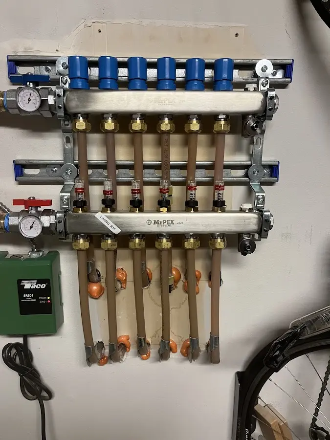 Plumber performing Water Heater Repair at a residential property in Huntersville